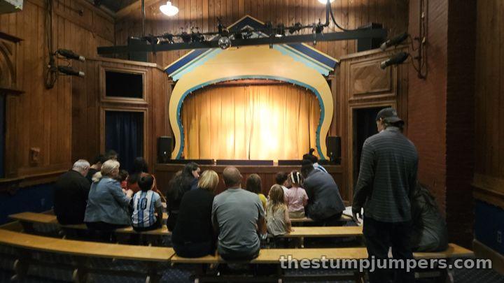 The tiny, old-fashioned theater, just before showtime. Best seats in the house.