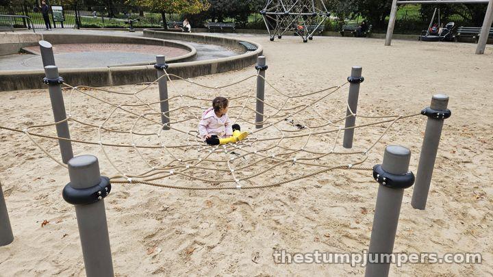 The spider web, out in the sand.